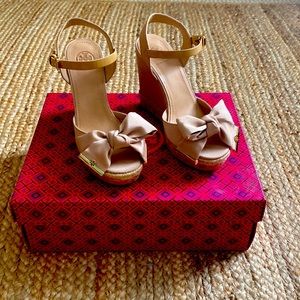 Tory Burch tan wedge sandals.